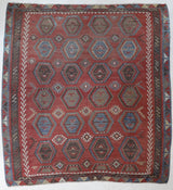 Vintage kilim rug in living room setting, old rug, antique rug, pastel colors, faded colors, Turkish rug, vintage rug, soft rug, Portland, Oregon, rug store, rug shop, local shop, earthy tones, earthy colors, warm colors