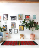 Vintage Turkish runner rug in a living room setting, pile rug, Turkish rug, vintage rug, portland, rug shop, bright colors, wild shaman, soft rug, bold color, Portland, Oregon, rug store, rug shop, local shop, antique rug