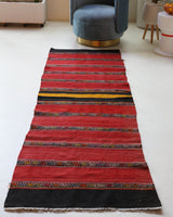 Vintage Turkish runner rug in a living room setting, pile rug, Turkish rug, vintage rug, portland, rug shop, bright colors, wild shaman, soft rug, bold color, Portland, Oregon, rug store, rug shop, local shop, antique rug