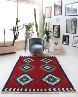 Vintage kilim rug in room decor setting, old rug, antique rug, pastel colors, faded colors, Turkish rug, vintage rug, soft rug, Portland, Oregon, rug store, rug shop, local shop, bold colors, bright colors, faded colors