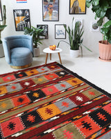 Vintage kilim rug in living room setting, bright colors, wild shaman, soft rug, bold color, Portland, Oregon, rug store, rug shop, local shop, vintage rug, modern kilim, warm colors