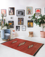 Vintage kilim rug in living room setting, bright colors, wild shaman, soft rug, bold color, Portland, Oregon, rug store, rug shop, local shop, vintage rug, modern kilim, warm colors