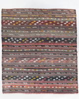 Vintage kilim rug in living room setting, old rug, antique rug, pastel colors, faded colors, Turkish rug, vintage rug, soft rug, Portland, Oregon, rug store, rug shop, local shop, earthy tones, earthy colors, warm colors