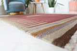 Vintage kilim rug in living room setting, old rug, antique rug, pastel colors, faded colors, Turkish rug, vintage rug, soft rug, Portland, Oregon, rug store, rug shop, local shop, earthy tones, earthy colors, warm colors