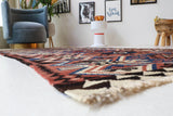 Vintage Turkish runner rug in a living room setting, pile rug, Turkish rug, vintage rug, portland, rug shop, bright colors, wild shaman, soft rug, bold color, Portland, Oregon, rug store, rug shop, local shop, antique rug