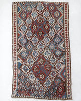 Vintage kilim rug in room decor setting, old rug, antique rug, pastel colors, faded colors, Turkish rug, vintage rug, soft rug, Portland, Oregon, rug store, rug shop, local shop, bold colors, bright colors, faded colors