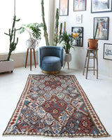 Vintage kilim rug in room decor setting, old rug, antique rug, pastel colors, faded colors, Turkish rug, vintage rug, soft rug, Portland, Oregon, rug store, rug shop, local shop, bold colors, bright colors, faded colors