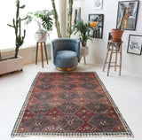 Vintage kilim rug in living room setting, bright colors, wild shaman, soft rug, bold color, Portland, Oregon, rug store, rug shop, local shop, vintage rug, modern kilim, warm colors