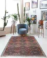 Vintage kilim rug in living room setting, bright colors, wild shaman, soft rug, bold color, Portland, Oregon, rug store, rug shop, local shop, vintage rug, modern kilim, warm colors