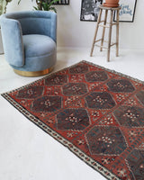 Vintage kilim rug in living room setting, bright colors, wild shaman, soft rug, bold color, Portland, Oregon, rug store, rug shop, local shop, vintage rug, modern kilim, warm colors