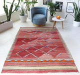 Vintage kilim rug in living room setting, bright colors, wild shaman, soft rug, bold color, Portland, Oregon, rug store, rug shop, local shop, vintage rug, modern kilim, warm colors