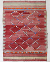 Vintage kilim rug in living room setting, bright colors, wild shaman, soft rug, bold color, Portland, Oregon, rug store, rug shop, local shop, vintage rug, modern kilim, warm colors