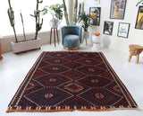 Vintage kilim rug in living room setting, bright colors, wild shaman, soft rug, bold color, Portland, Oregon, rug store, rug shop, local shop, vintage rug, modern kilim, warm colors