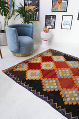 Vintage kilim rug in living room setting, bright colors, wild shaman, soft rug, bold color, Portland, Oregon, rug store, rug shop, local shop, vintage rug, modern kilim, warm colors
