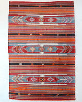 Vintage kilim rug in room decor setting, old rug, antique rug, pastel colors, faded colors, Turkish rug, vintage rug, soft rug, Portland, Oregon, rug store, rug shop, local shop, bold colors, bright colors,