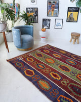 Vintage kilim rug in living room setting, bright colors, wild shaman, soft rug, bold color, Portland, Oregon, rug store, rug shop, local shop, vintage rug, modern kilim, warm colors