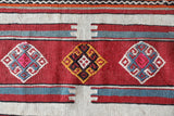 Vintage kilim rug in room decor setting, old rug, antique rug, pastel colors, faded colors, Turkish rug, vintage rug, soft rug, Portland, Oregon, rug store, rug shop, local shop, bold colors, bright colors,