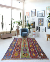 Vintage kilim rug in living room setting, bright colors, wild shaman, soft rug, bold color, Portland, Oregon, rug store, rug shop, local shop, vintage rug, modern kilim, warm colors