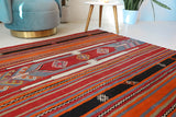 Vintage kilim rug in room decor setting, old rug, antique rug, pastel colors, faded colors, Turkish rug, vintage rug, soft rug, Portland, Oregon, rug store, rug shop, local shop, bold colors, bright colors,