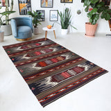 Vintage kilim rug in living room setting, bright colors, wild shaman, soft rug, bold color, Portland, Oregon, rug store, rug shop, local shop, vintage rug, modern kilim, warm colors