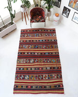 Vintage kilim rug in room decor setting, old rug, antique rug, pastel colors, faded colors, Turkish rug, vintage rug, soft rug, Portland, Oregon, rug store, rug shop, local shop, bold colors, bright colors, faded colors