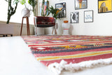 Vintage kilim rug in room decor setting, old rug, antique rug, pastel colors, faded colors, Turkish rug, vintage rug, soft rug, Portland, Oregon, rug store, rug shop, local shop, bold colors, bright colors, faded colors