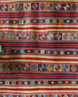 Vintage kilim rug in room decor setting, old rug, antique rug, pastel colors, faded colors, Turkish rug, vintage rug, soft rug, Portland, Oregon, rug store, rug shop, local shop, bold colors, bright colors, faded colors