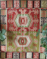 Vintage kilim rug in living room setting, old rug, antique rug, pastel colors, faded colors, Turkish rug, vintage rug, soft rug, Portland, Oregon, rug store, rug shop, local shop, earthy tones, earthy colors, warm colors