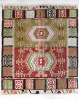 Vintage kilim rug in living room setting, old rug, antique rug, pastel colors, faded colors, Turkish rug, vintage rug, soft rug, Portland, Oregon, rug store, rug shop, local shop, earthy tones, earthy colors, warm colors