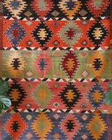 Vintage kilim rug in living room setting, bright colors, wild shaman, soft rug, bold color, Portland, Oregon, rug store, rug shop, local shop, vintage rug, modern kilim, warm colors