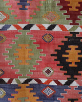 Vintage kilim rug in living room setting, bright colors, wild shaman, soft rug, bold color, Portland, Oregon, rug store, rug shop, local shop, vintage rug, modern kilim, warm colors