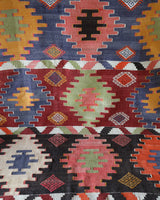 Vintage kilim rug in living room setting, bright colors, wild shaman, soft rug, bold color, Portland, Oregon, rug store, rug shop, local shop, vintage rug, modern kilim, warm colors