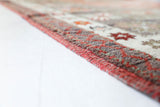 Vintage Turkish rug in living room setting, old rug, antique rug, pastel colors, faded colors, Turkish rug, vintage rug, soft rug, Portland, Oregon, rug store, rug shop, local shop