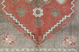 Vintage Turkish rug in living room setting, old rug, antique rug, pastel colors, faded colors, Turkish rug, vintage rug, soft rug, Portland, Oregon, rug store, rug shop, local shop
