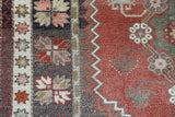 Vintage Turkish rug in living room setting, old rug, antique rug, pastel colors, faded colors, Turkish rug, vintage rug, soft rug, Portland, Oregon, rug store, rug shop, local shop