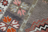 Vintage Turkish rug in living room setting, old rug, antique rug, pastel colors, faded colors, Turkish rug, vintage rug, soft rug, Portland, Oregon, rug store, rug shop, local shop