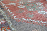 Vintage Turkish rug in living room setting, old rug, antique rug, pastel colors, faded colors, Turkish rug, vintage rug, soft rug, Portland, Oregon, rug store, rug shop, local shop