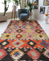 Vintage kilim rug in living room setting, bright colors, wild shaman, soft rug, bold color, Portland, Oregon, rug store, rug shop, local shop, vintage rug, modern kilim, warm colors