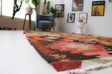 Vintage kilim rug in living room setting, bright colors, wild shaman, soft rug, bold color, Portland, Oregon, rug store, rug shop, local shop, vintage rug, modern kilim, warm colors