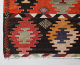 Vintage kilim rug in living room setting, bright colors, wild shaman, soft rug, bold color, Portland, Oregon, rug store, rug shop, local shop, vintage rug, modern kilim, warm colors