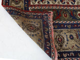 Antique Turkish rug in a living room setting, pile rug, Turkish rug, vintage rug, portland, rug shop, bright colors, wild shaman, soft rug, bold color, Portland, Oregon, rug store, rug shop, local shop, antique rug