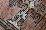 Vintage Turkish rug in living room setting, old rug, antique rug, pastel colors, faded colors, Turkish rug, vintage rug, soft rug, Portland, Oregon, rug store, rug shop, local shop