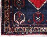 Vintage Turkish rug in a living room setting, pile rug, Turkish rug, vintage rug, portland, rug shop, bright colors, wild shaman, soft rug, bold color, Portland, Oregon, rug store, rug shop, local shop, antique rug
