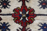 Vintage Turkish rug in a living room setting, pile rug, Turkish rug, vintage rug, portland, rug shop, bright colors, wild shaman, soft rug, bold color, Portland, Oregon, rug store, rug shop, local shop, antique rug