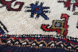Vintage Turkish rug in a living room setting, pile rug, Turkish rug, vintage rug, portland, rug shop, bright colors, wild shaman, soft rug, bold color, Portland, Oregon, rug store, rug shop, local shop, antique rug