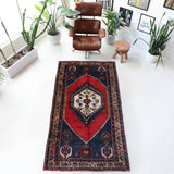 Vintage Turkish rug in a living room setting, pile rug, Turkish rug, vintage rug, portland, rug shop, bright colors, wild shaman, soft rug, bold color, Portland, Oregon, rug store, rug shop, local shop, antique rug