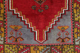 Vintage Turkish rug in a living room setting, pile rug, Turkish rug, vintage rug, portland, rug shop, bright colors, wild shaman, soft rug, bold color, Portland, Oregon, rug store, rug shop, local shop, antique rug