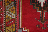 Vintage Turkish rug in a living room setting, pile rug, Turkish rug, vintage rug, portland, rug shop, bright colors, wild shaman, soft rug, bold color, Portland, Oregon, rug store, rug shop, local shop, antique rug