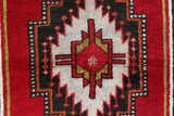 Vintage Turkish rug in a living room setting, pile rug, Turkish rug, vintage rug, portland, rug shop, bright colors, wild shaman, soft rug, bold color, Portland, Oregon, rug store, rug shop, local shop, antique rug