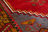 Vintage Turkish rug in a living room setting, pile rug, Turkish rug, vintage rug, portland, rug shop, bright colors, wild shaman, soft rug, bold color, Portland, Oregon, rug store, rug shop, local shop, antique rug